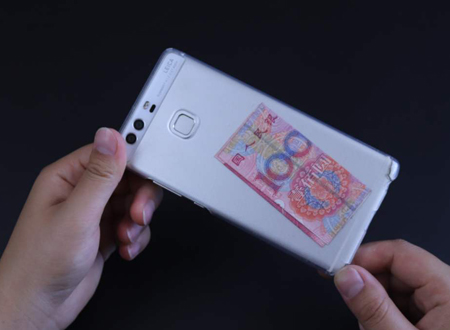 手机后面放钱什么意思